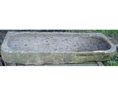 A large 19th century sandstone salting trough / shallow sink with two rounded corners. Approximately 170cm long, 75cm wide, 1