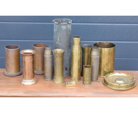 A collection of early to mid 20th century trench art to include vases, a trinket box with Mother of Pearl / abalone inlay and