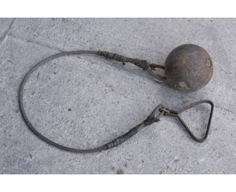 A vintage metal ball and chain for the hammer throw, presumed to be Scottish, 114cm long.  