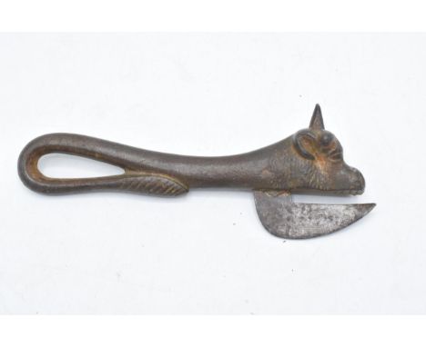 An early to mid 20th century Army Bully Beef cast iron tin opener in the form of a bull  
