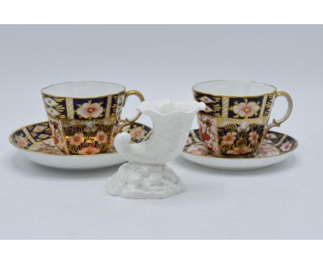 A collection of pottery to include Royal Crown Derby Imari cups and saucers x 2 and a Royal Worcester 3212 Cornucopia shaped 