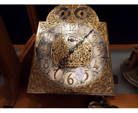 A rare Tiffany & Co chiming longcase clock movement with gilt foliate fretwork face silvered chapter ring and Arabic numerals