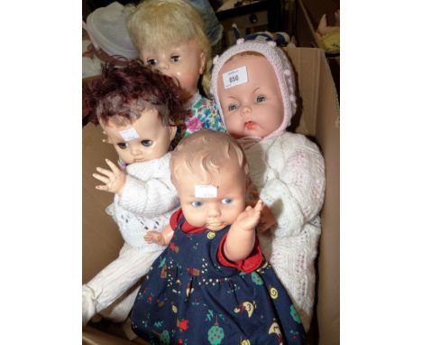 A composition girl doll stamped "BND London" with voice, in floral dress; a Pedigree girl doll in knitted cardigan; a Chilter