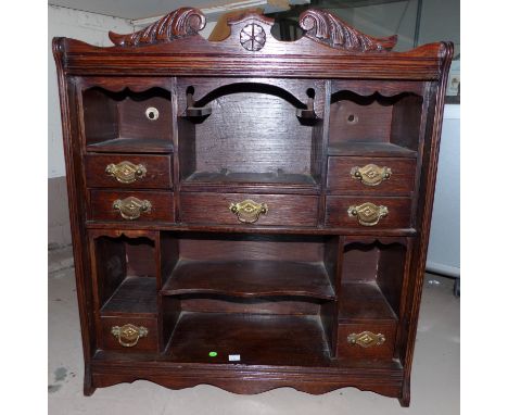 An Edwardian display shelf with drawers, width 21½"