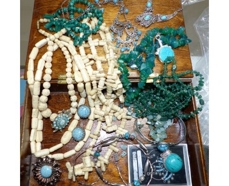 A selection of turquoise and jade coloured necklaces, carved bon etc