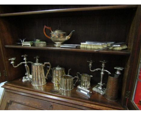 A selection of mostly plated wares including tea set, Deco dressing table set, cigarette case and candlesticks