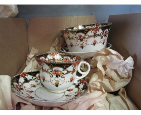 A box containing a Beswick part tea set, white ground with gilt and floral sprays