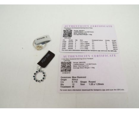 A blue diamond circular pendant and a diamond set floral ring with certificate 