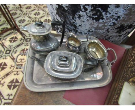 A four piece plated tea set on associated tray