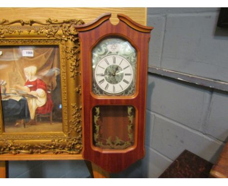 A City of London wall hanging clock and a barometer (2)