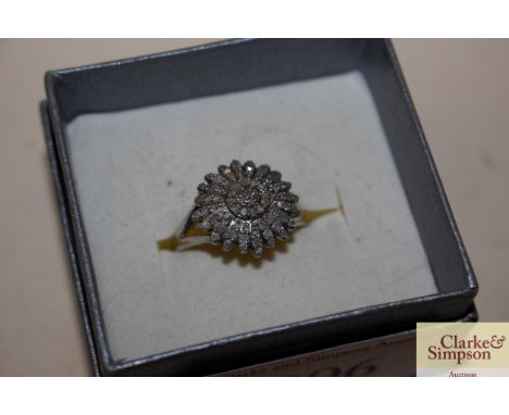 A silver and Pavé diamond set ring with Chrysanthemum face 