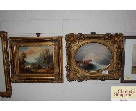 Two oil paintings contained in gilt frames depicting a seascape and a country path