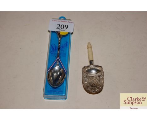 A Georgian silver and bone caddy spoon; and a souvenir spoon 