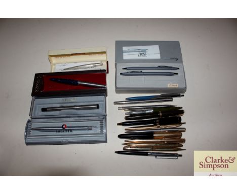 A box of various fountainpens to include Parker and other examples, various ball point pens, and a Life Long Sterling silver 