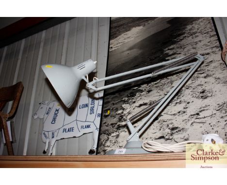 An angle poise type lamp