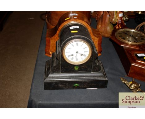 A slate two hole mantel clock 