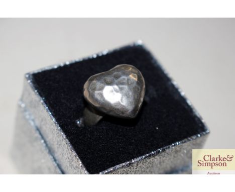 A boxed 925 beaten heart shaped ring 