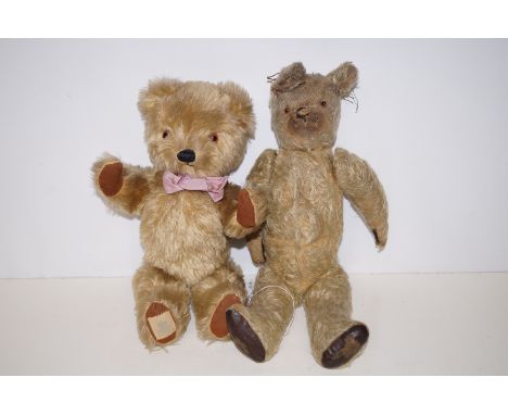 Early 20th century straw stuffed teddy bear with long snout, together with a Chad Valley bear 