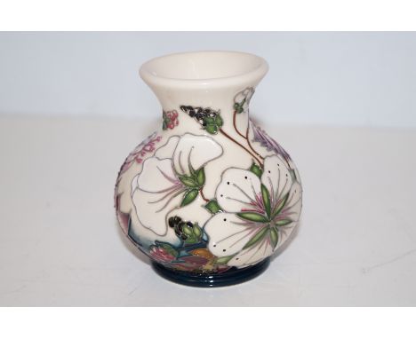 Moorcroft vase in the Bramble Revisited pattern, height 10cm 