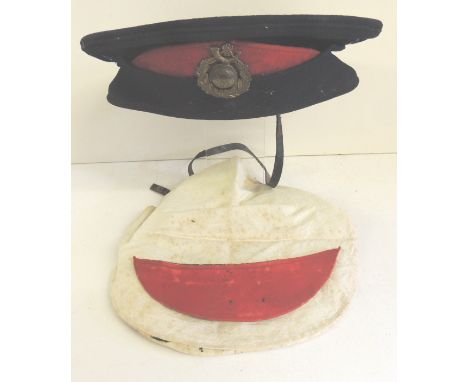 A Royal Marine Light Infantry Broderick cap with original brass badge, white cap cover and spare red felt half moon to fit be
