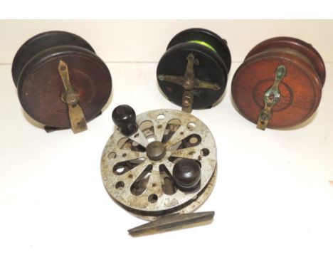 FISHING - a dark wood Nottingham style reel 3.75" with brass star back; two wood and brass reels and an openwork white metal 