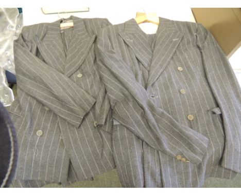 A ladies wool light grey pinstripe jacket and skirt together with a gentlemans three piece light grey pinstripe suit, c.1940'