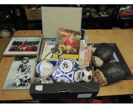 A collection of football memorabilia including various programmes; framed photo of George Best; modern autographed souvenir f