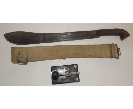 An early 20th Century machete with wire bound wood grip, overall length 57cms together with a military webbing belt and a mor