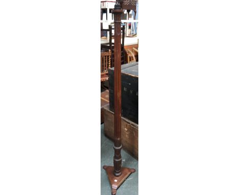 A reeded standard lamp with wheat sheaf detail, 170cmH 