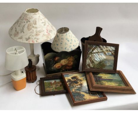 A mixed lot to include two table lamps, together with a 1970s Pifco battery powered lamp, several needlework pictures, and a 