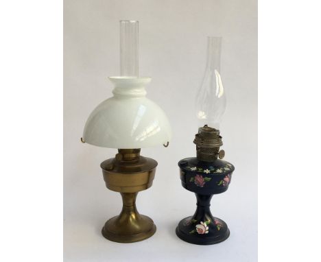 A brass oil lamp, with chimney and milk glass shade; together with a painted oil lamp with chimney 