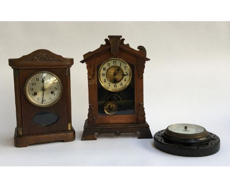An oak cased 1930s mantel clock; together with one other and a barometer 