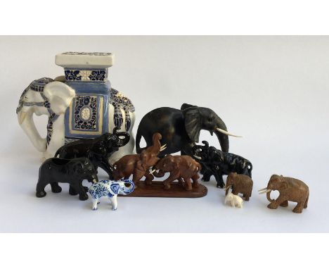Elephant interest, a collection of ceramic, hardstone and wooden carved elephants, various sizes 