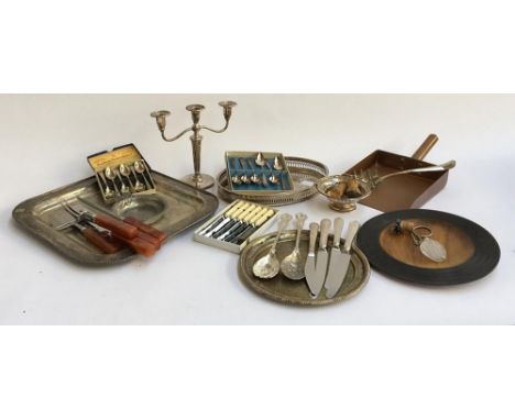 A mixed lot of plated and other metal items to include various trays, cased teaspoons, flat copper shovel, three arm candlest
