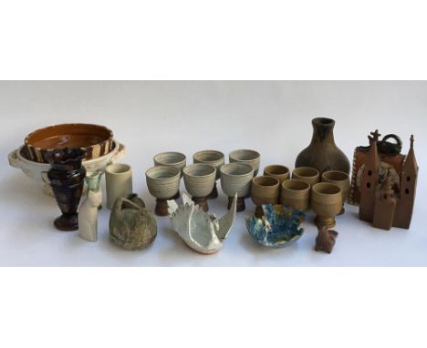 A mixed lot of studio pottery to include two sets of six goblets, several salad bowls, swan trinket dish etc 
