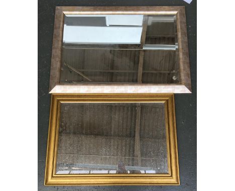 Three large modern gilt framed wall mirrors, each with bevelled glass, the two larger made by Manuscript ltd. 75x106cm, 70x10