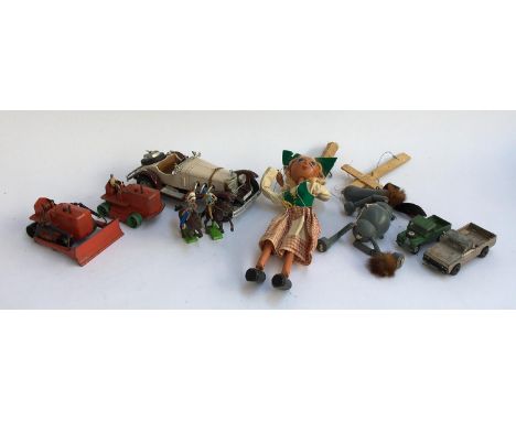 A mixed lot of toys to include Corgi Land Rover and Mazda B 1600 pickup, Dinky Blawknox bulldozer, and a Dinky heavy tractor;