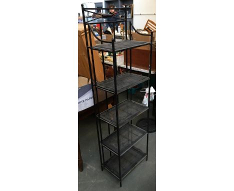 A large foldable metal shelf unit 