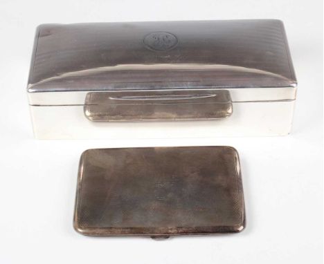 A George V silver rectangular cigarette case with engine turned decoration, London 1934 by Alfred Dunhill &amp; Sons, weight 