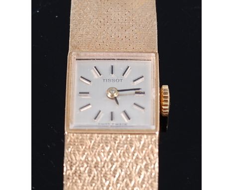 A Tissot 9ct gold cased ladies bracelet watch, having a signed square dial with baton markers, seventeen jewel mechanical mov