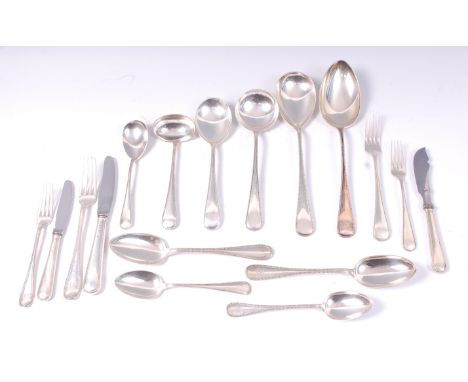 A harlequin suite of Danish silver cutlery, comprising a set of five table forks, set of seven dessert forks, set of four tab