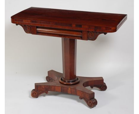 A William IV rosewood pedestal card table, the D-shaped fold-over top with swivel action, opening to reveal baize lined playi