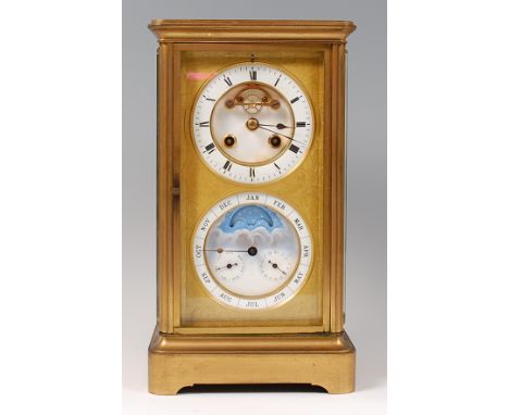 A French gilt bronze striking four glass mantel clock, with perpetual calendar and moonphase, circa 1870, having white enamel