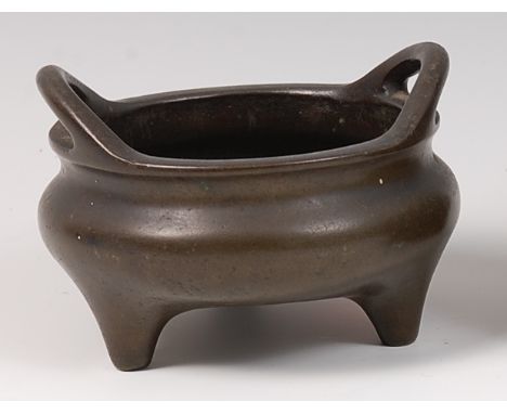 A Chinese bronze tripod censor, bearing four character mark verso, weight 1,188g, dia. 12cm