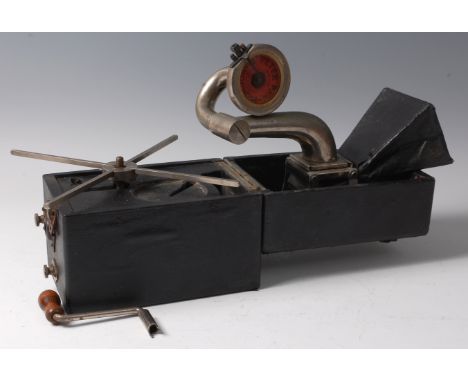 An early 20th century Peter Pan camera-form gramophone, the leather covered body opening to reveal folding bellows to the lid