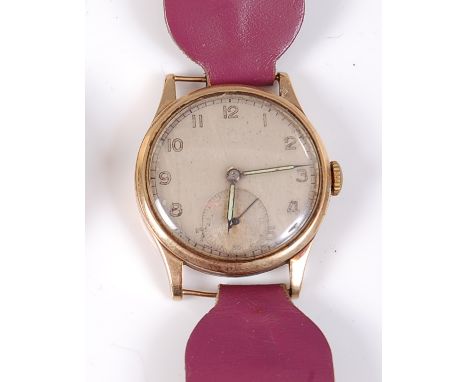 A gents Omega 9ct gold cased wristwatch, having a signed silvered dial (tarnished), with luminous hands, subsidiary seconds d