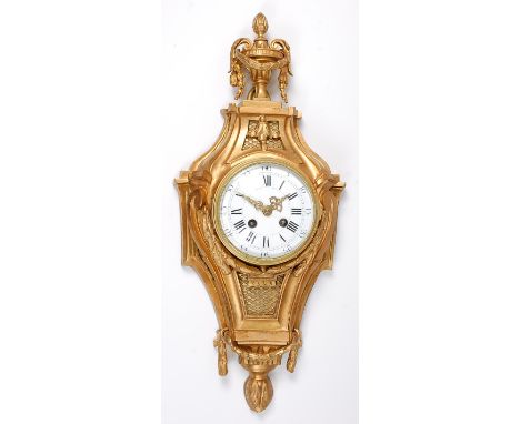 A mid-19th century French gilt bronze cartel clock, the convex white enamel dial having Roman and Arabic numerals, twin windi