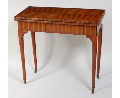 A George II laburnum veneered card table, the top having a four quarter veneer and feather banding, opening to reveal baize l