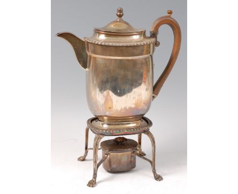 A late George III silver hot water jug, having acorn finial and fruitwood C-scroll handle, on matching silver stand with hair