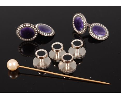 A pair of silver and guilloche enamel gents cufflinks, with white dot enamel borders, bearing triple crown assay for Sweden a